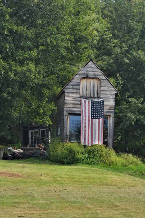 flag draped over shed